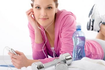 Fitness woman listen music mp3 relax gym